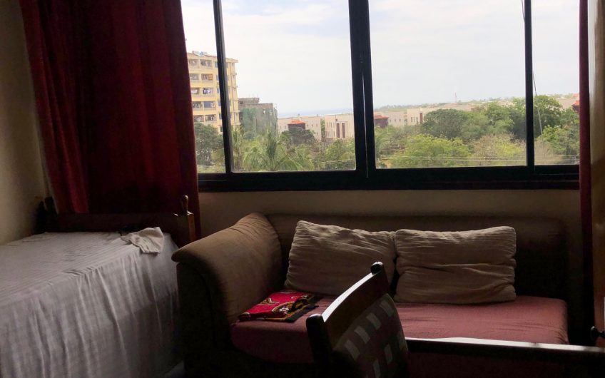 KIZINGO: 4BR APARTMENT FOR SALE