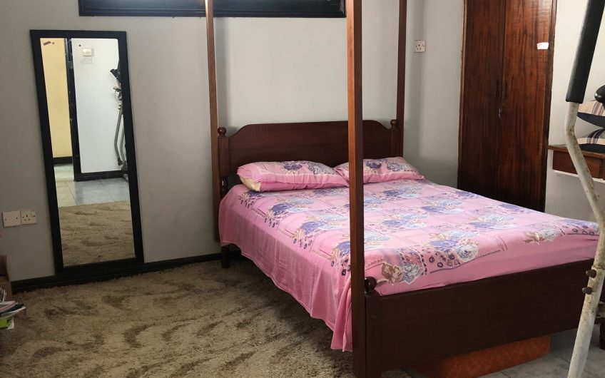 KIZINGO: 4BR APARTMENT FOR SALE