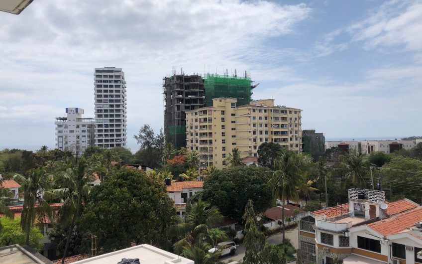 KIZINGO: 4BR APARTMENT FOR SALE
